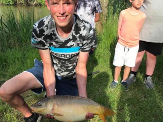 Young man with carp 5
