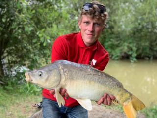 Young man with carp 6