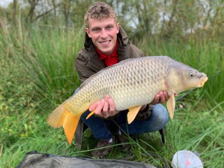 Young man with carp 12