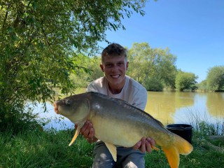 Young man with carp 4