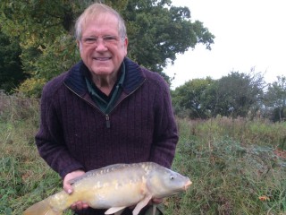 Angler with carp 4