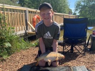 Boy with carp 2