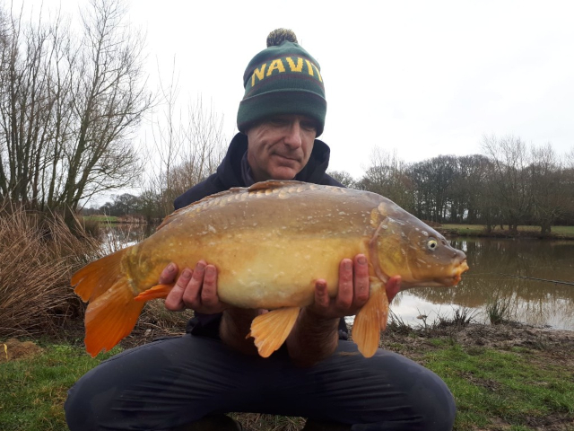 Angler with carp 10