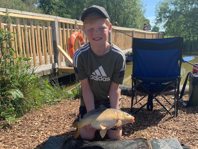 Boy with carp 2